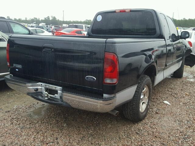 1FTRX17W62KA55952 - 2002 FORD F150 BLACK photo 4