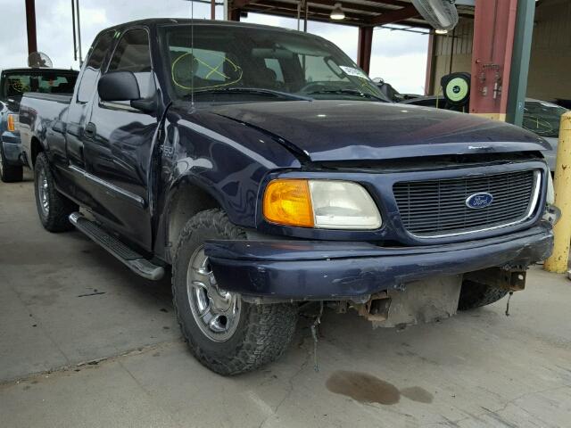 2FTRX17214CA49593 - 2004 FORD F-150 HERI BLUE photo 1