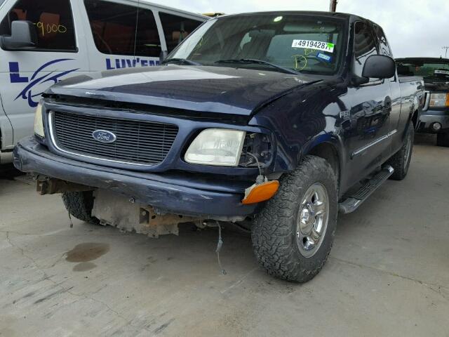 2FTRX17214CA49593 - 2004 FORD F-150 HERI BLUE photo 2