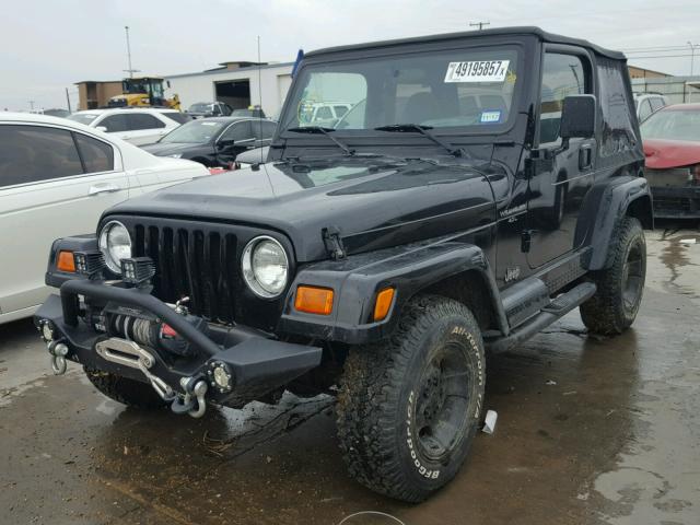 1J4FA59SXYP764024 - 2000 JEEP WRANGLER / BLACK photo 2