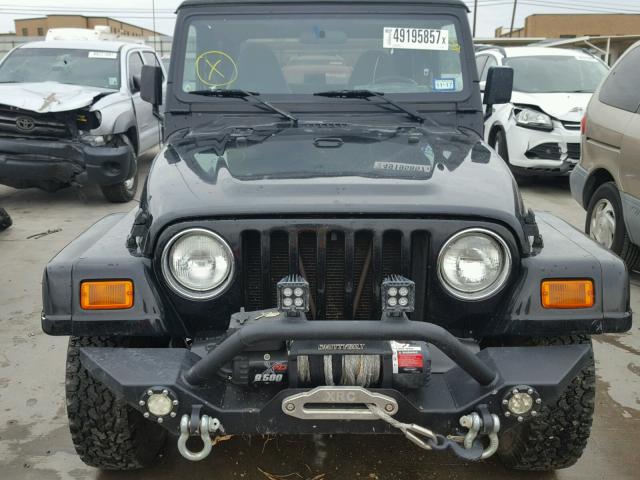 1J4FA59SXYP764024 - 2000 JEEP WRANGLER / BLACK photo 9