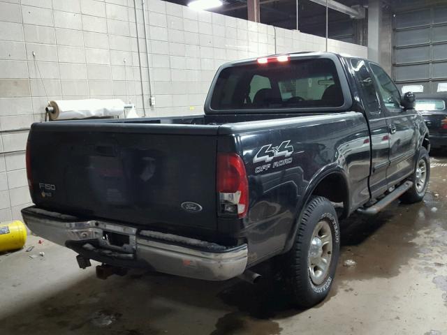 1FTRX18L4XKB86485 - 1999 FORD F150 BLACK photo 4