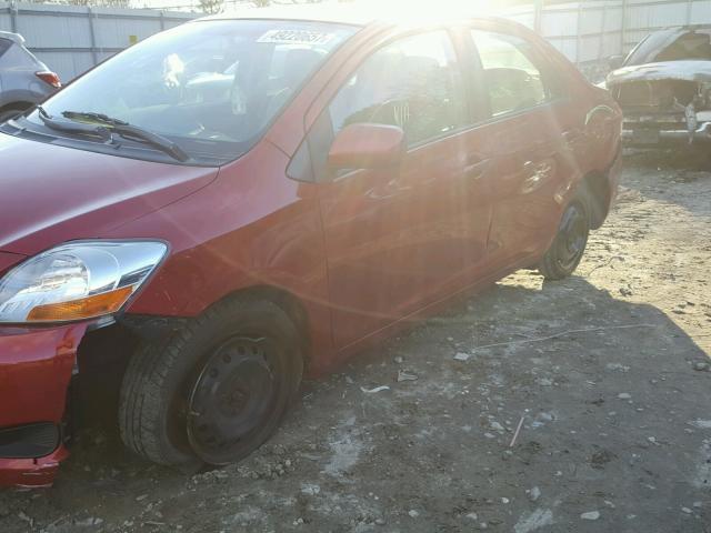 JTDBT923381215289 - 2008 TOYOTA YARIS RED photo 9