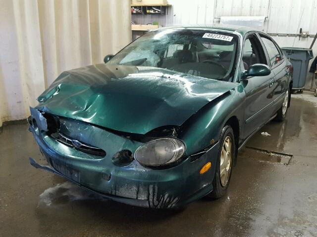 1FAFP53UXXG108070 - 1999 FORD TAURUS SE GREEN photo 2