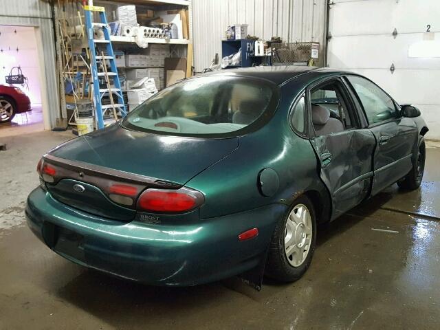 1FAFP53UXXG108070 - 1999 FORD TAURUS SE GREEN photo 4