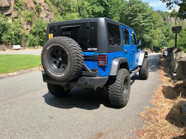 1J4BA3H15BL531386 - 2011 JEEP WRANGLER U BLUE photo 5