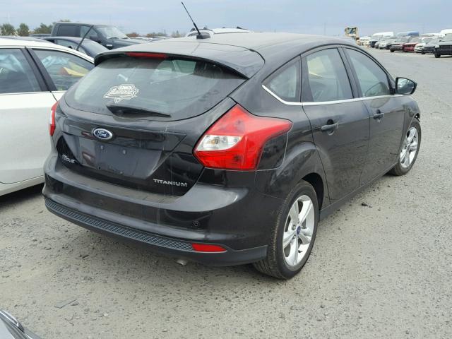 1FAHP3N29CL337317 - 2012 FORD FOCUS BLACK photo 4