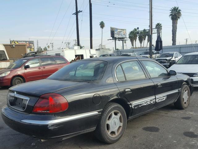 1LNHM97V11Y666943 - 2001 LINCOLN CONTINENTA BLACK photo 4