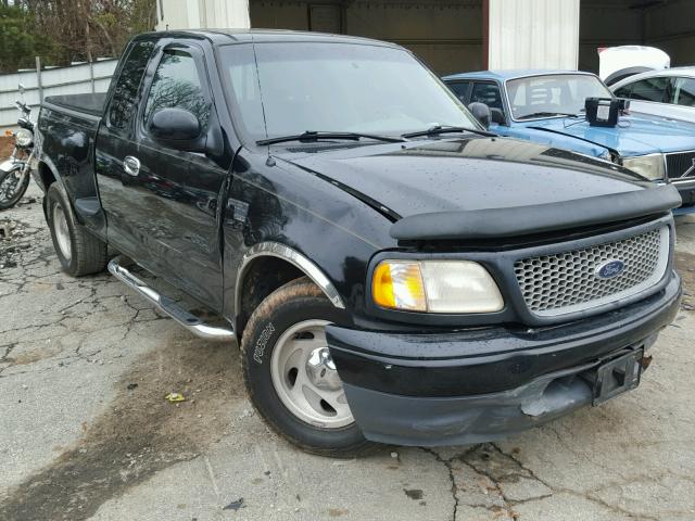 1FTRX07L7XKC03534 - 1999 FORD F150 BLACK photo 1