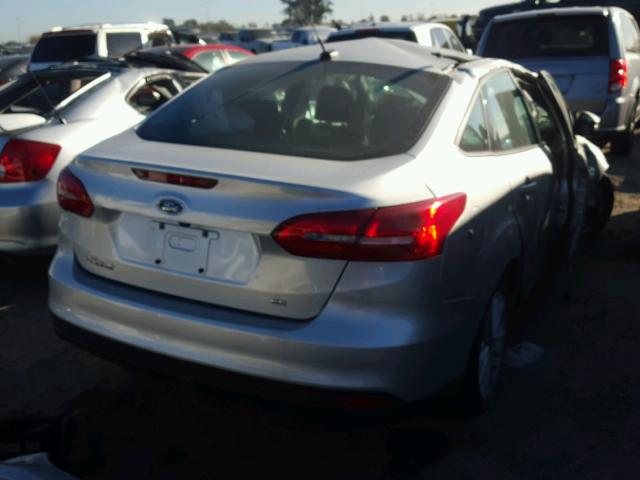 1FADP3F21HL268577 - 2017 FORD FOCUS SE SILVER photo 4