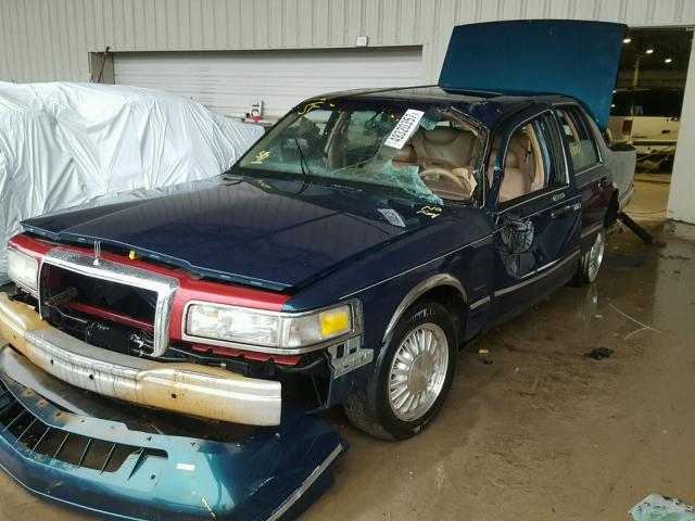 1LNLM82W7VY752039 - 1997 LINCOLN TOWN CAR S GREEN photo 2