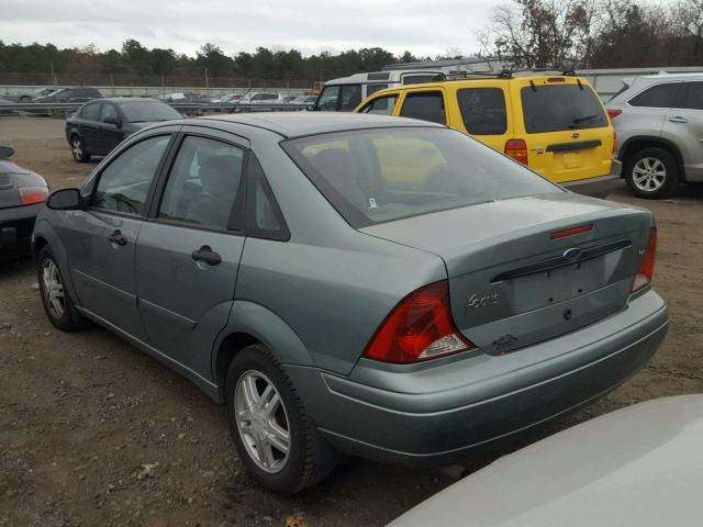 1FAFP34P83W331883 - 2003 FORD FOCUS SE GREEN photo 3