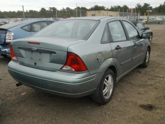 1FAFP34P83W331883 - 2003 FORD FOCUS SE GREEN photo 4