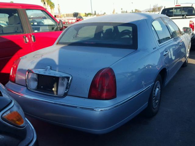 1LNFM81W8WY641631 - 1998 LINCOLN TOWN CAR E BLUE photo 4