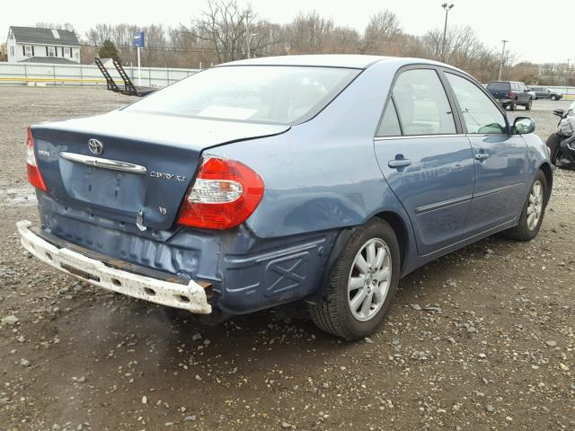 4T1BF30K42U529856 - 2002 TOYOTA CAMRY LE ლურჯი ფოტო 4