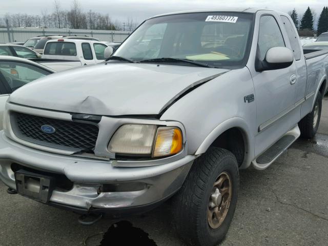 1FTDX18W0VKC77142 - 1997 FORD F150 SILVER photo 2