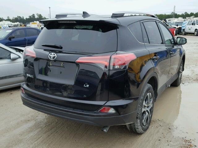 2T3ZFREV3HW355752 - 2017 TOYOTA RAV4 LE BLACK photo 4