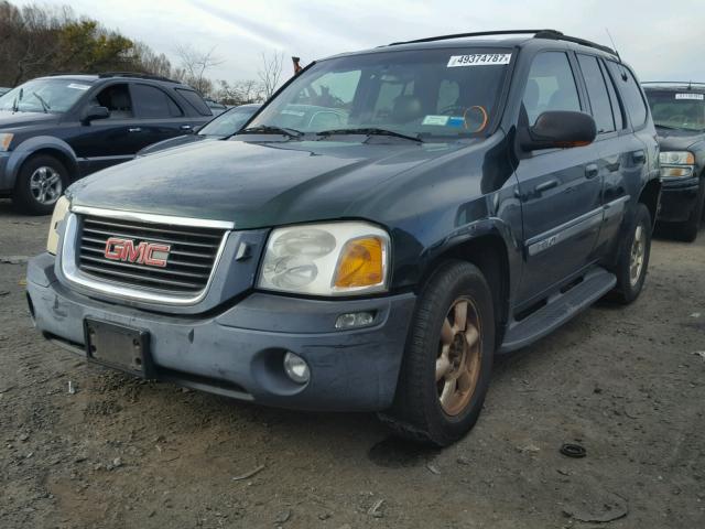 1GKDT13S622245215 - 2002 GMC ENVOY GREEN photo 2