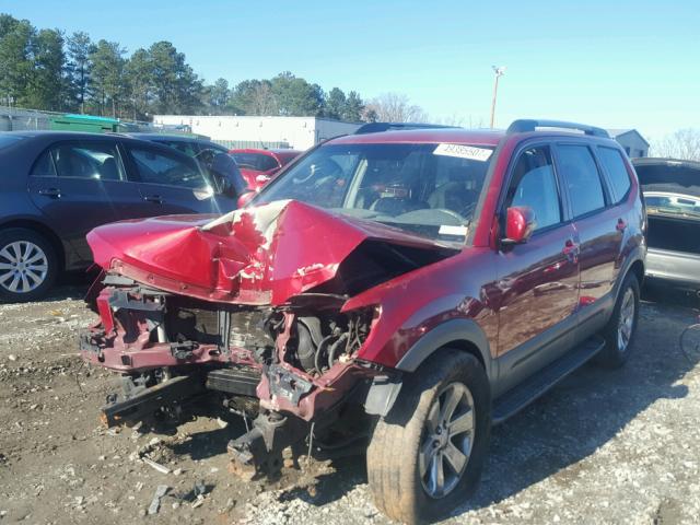 KNDJJ741995018767 - 2009 KIA BORREGO LX RED photo 2