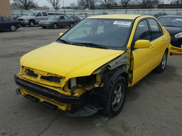 JA3AJ86E63U100408 - 2003 MITSUBISHI LANCER OZ YELLOW photo 2