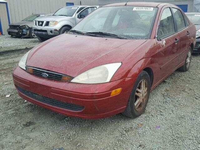 1FAFP34P5YW279717 - 2000 FORD FOCUS SE RED photo 2