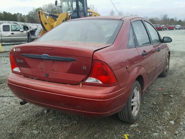 1FAFP34P5YW279717 - 2000 FORD FOCUS SE RED photo 4