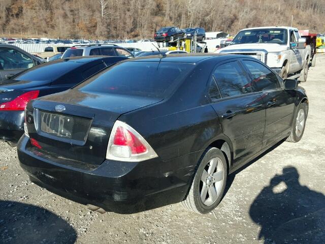 3FAHP07Z57R262132 - 2007 FORD FUSION SE BLACK photo 4