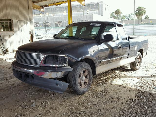 1FTZX17221NA44277 - 2001 FORD F150 BLACK photo 2