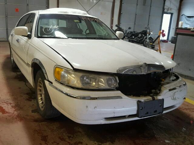 1LNHM81WXXY669859 - 1999 LINCOLN TOWN CAR E WHITE photo 1