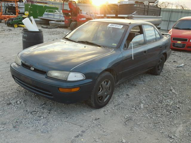 1Y1SK5360RZ090268 - 1994 GEO PRIZM BASE ტურკოუსი ფოტო 2