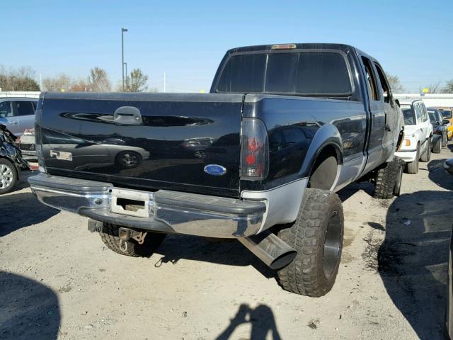 1FTSW31F32EC37048 - 2002 FORD F350 SRW S BLACK photo 4