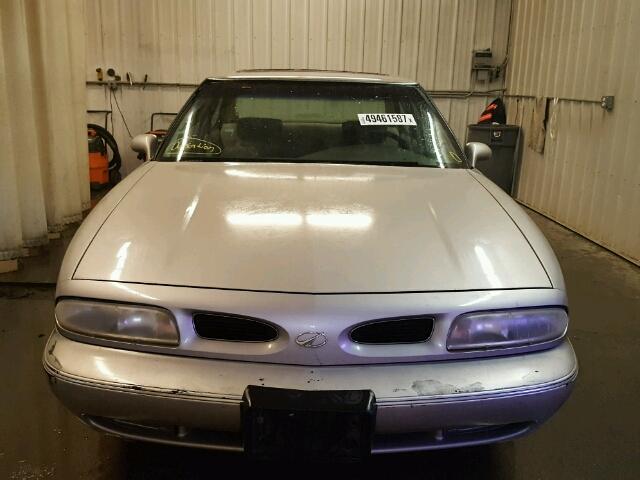 1G3HN52K7V4820883 - 1997 OLDSMOBILE 88 BASE TAN photo 9