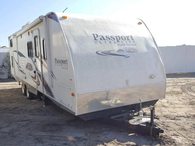4YDT29124BD410949 - 2011 KEYSTONE PASSPORT WHITE photo 1