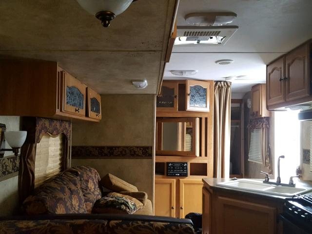 4YDT29124BD410949 - 2011 KEYSTONE PASSPORT WHITE photo 6