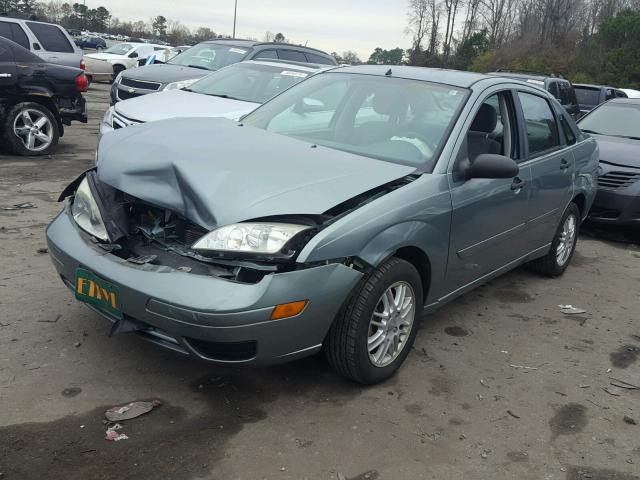 1FAFP34N05W263757 - 2005 FORD FOCUS ZX4 GREEN photo 2