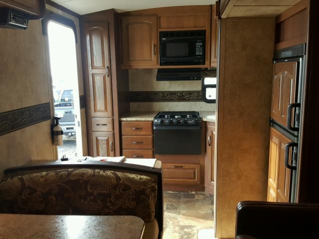 4YDT27225CB452868 - 2012 KEYSTONE OUTBACK BROWN photo 6