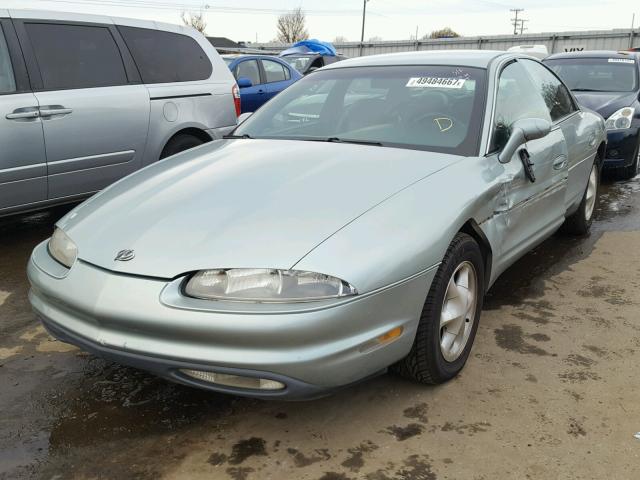 1G3GR62C0S4143010 - 1995 OLDSMOBILE AURORA GREEN photo 2