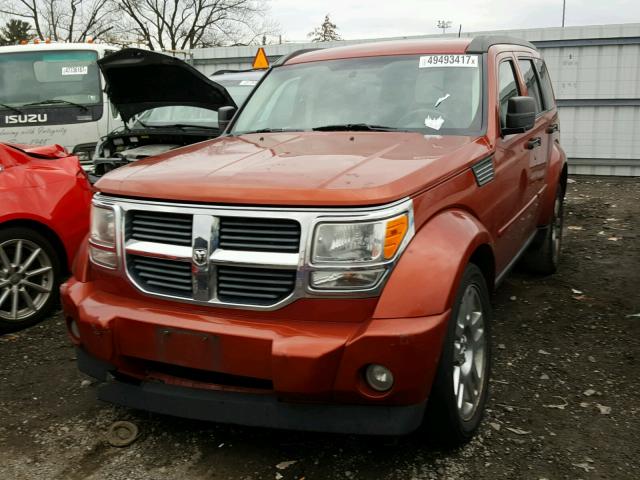 1D8GU58K38W151849 - 2008 DODGE NITRO SLT ORANGE photo 2