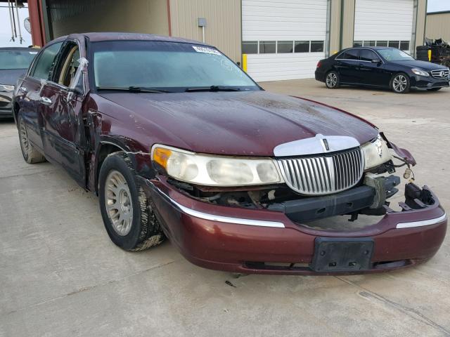 1LNHM83W4YY799540 - 2000 LINCOLN TOWN CAR C BURGUNDY photo 1