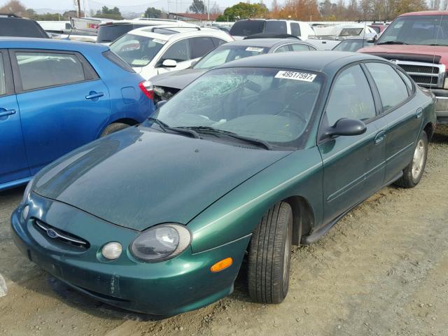 1FAFP53U2XA295002 - 1999 FORD TAURUS SE GREEN photo 2