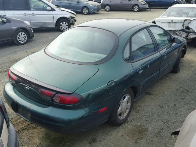 1FAFP53U2XA295002 - 1999 FORD TAURUS SE GREEN photo 4