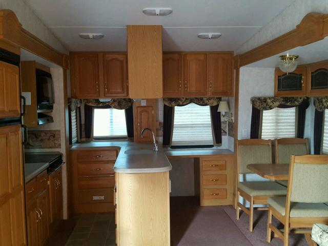 4YDF329264D510625 - 2004 KEYSTONE MONTANA WHITE photo 6