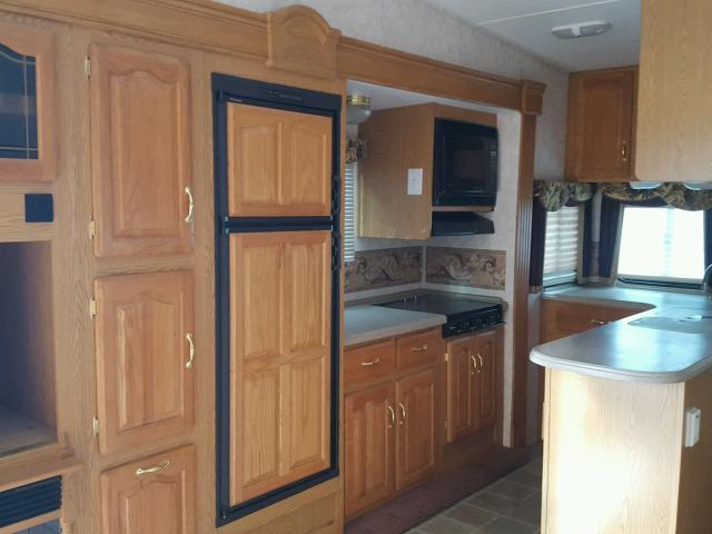 4YDF329264D510625 - 2004 KEYSTONE MONTANA WHITE photo 7