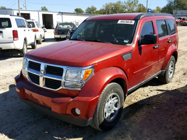 1D4PU2GK5BW507016 - 2011 DODGE NITRO SE RED photo 2