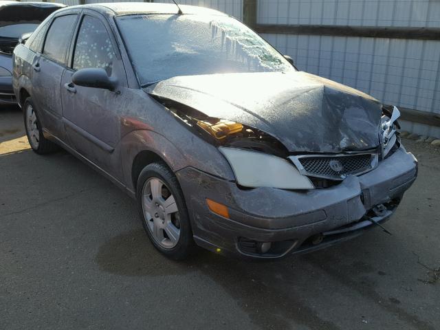 1FAFP34N17W207345 - 2007 FORD FOCUS ZX4 BLACK photo 1