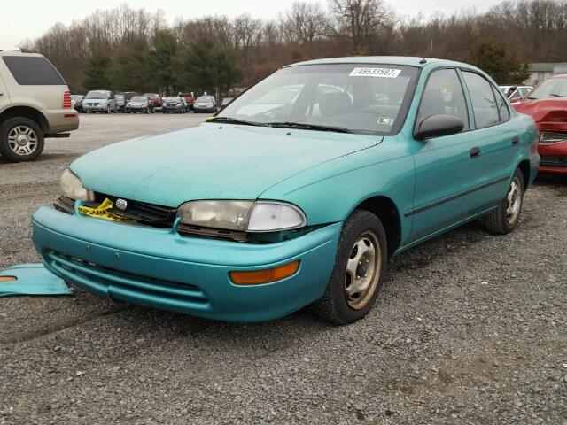 1Y1SK5368RZ093029 - 1994 GEO PRIZM GREEN photo 2