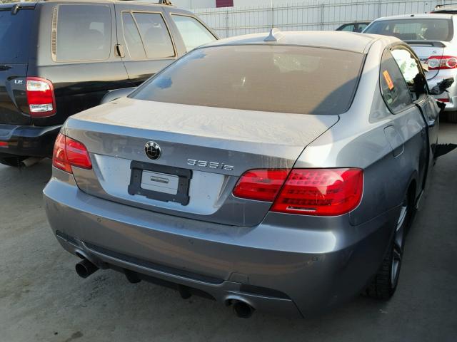 WBAKG1C53BE599433 - 2011 BMW 335 IS GRAY photo 4