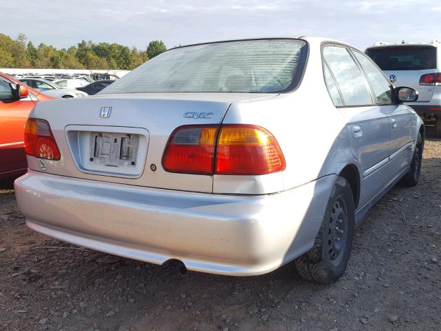 2HGEJ6619YH562588 - 2000 HONDA CIVIC BASE SILVER photo 4
