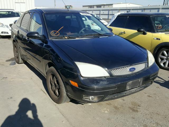 1FAFP38ZX6W154026 - 2006 FORD FOCUS ZX4 BLACK photo 1