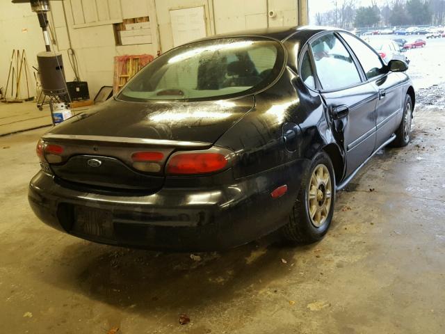 1FAFP52UXXA265313 - 1999 FORD TAURUS LX BLACK photo 4